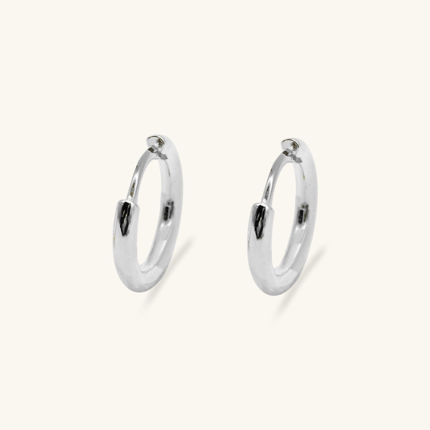 Subtle 15mm Hoop Earrings in Gold and Silver by HYMI